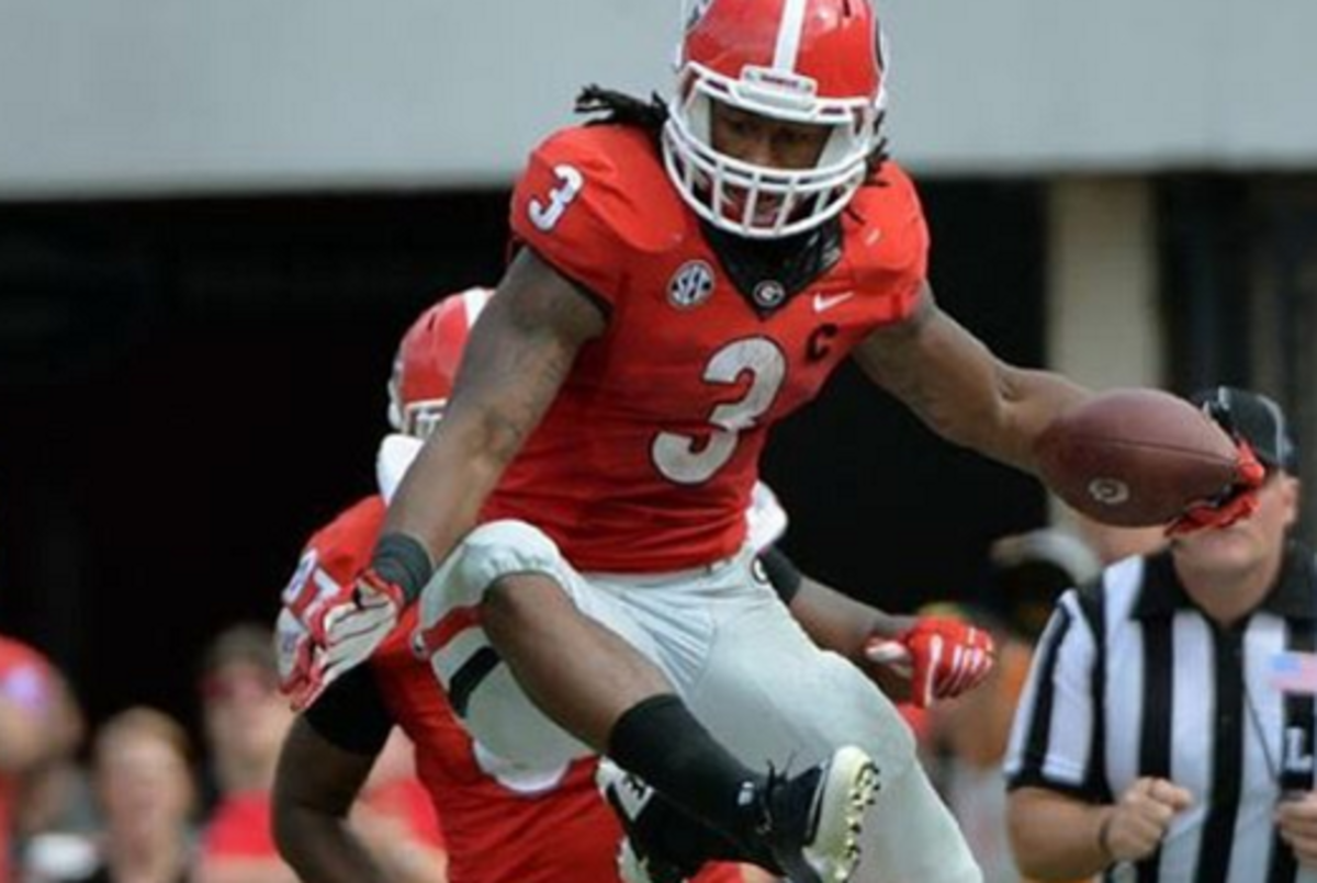 Todd Gurley runs the ball while playing for Georgia.