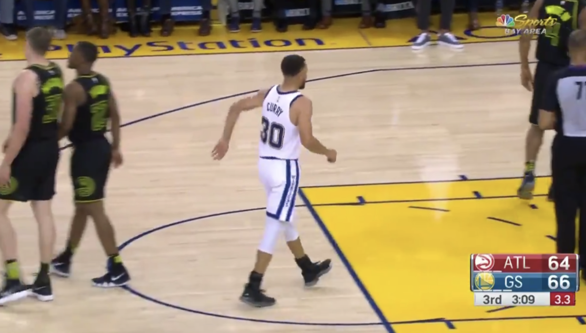 Steph Curry hobbles off the court with an injury.
