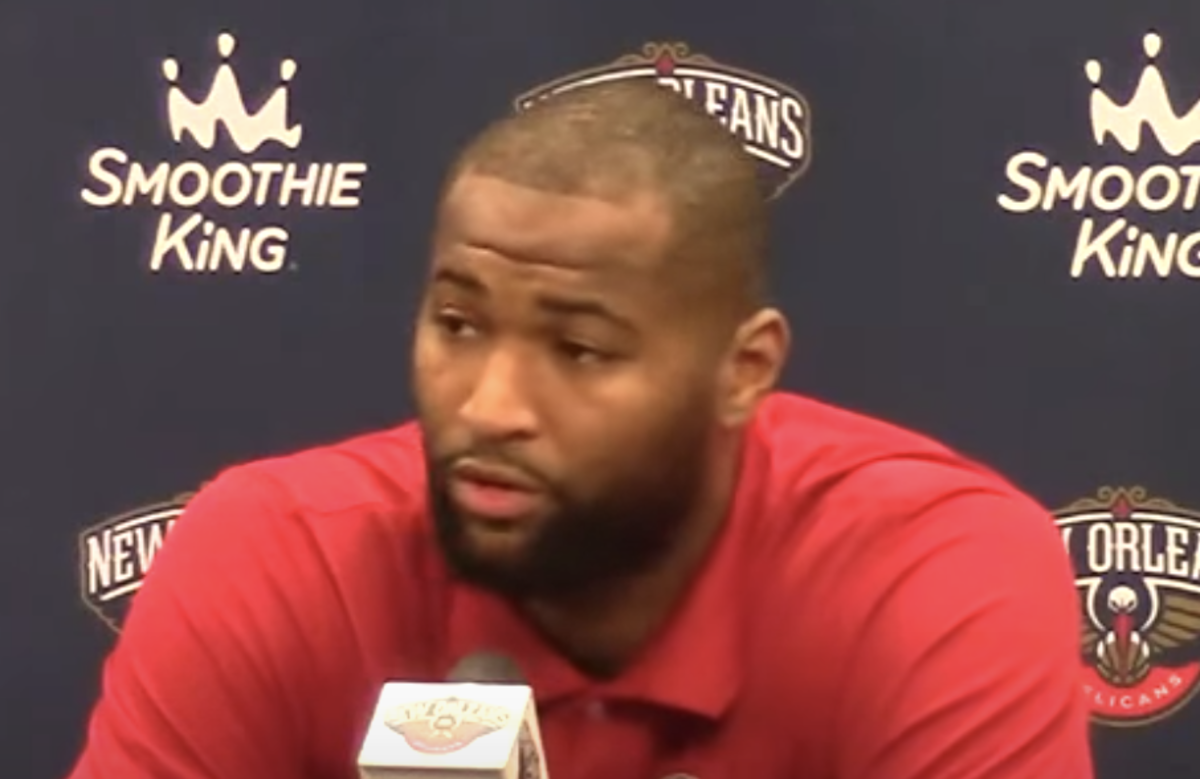 demarcus cousins speaks to reporters with the pelicans