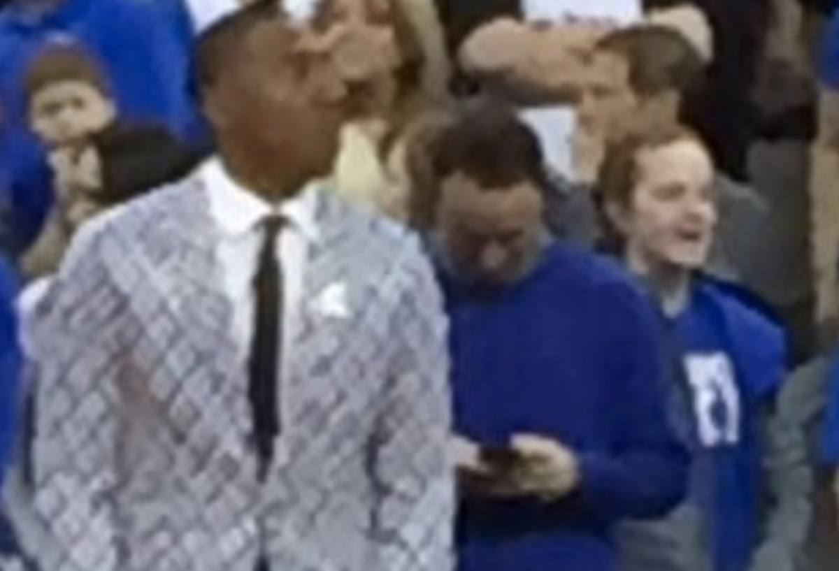 Nolan Smith wears an interesting sports jacket on Duke's bench.