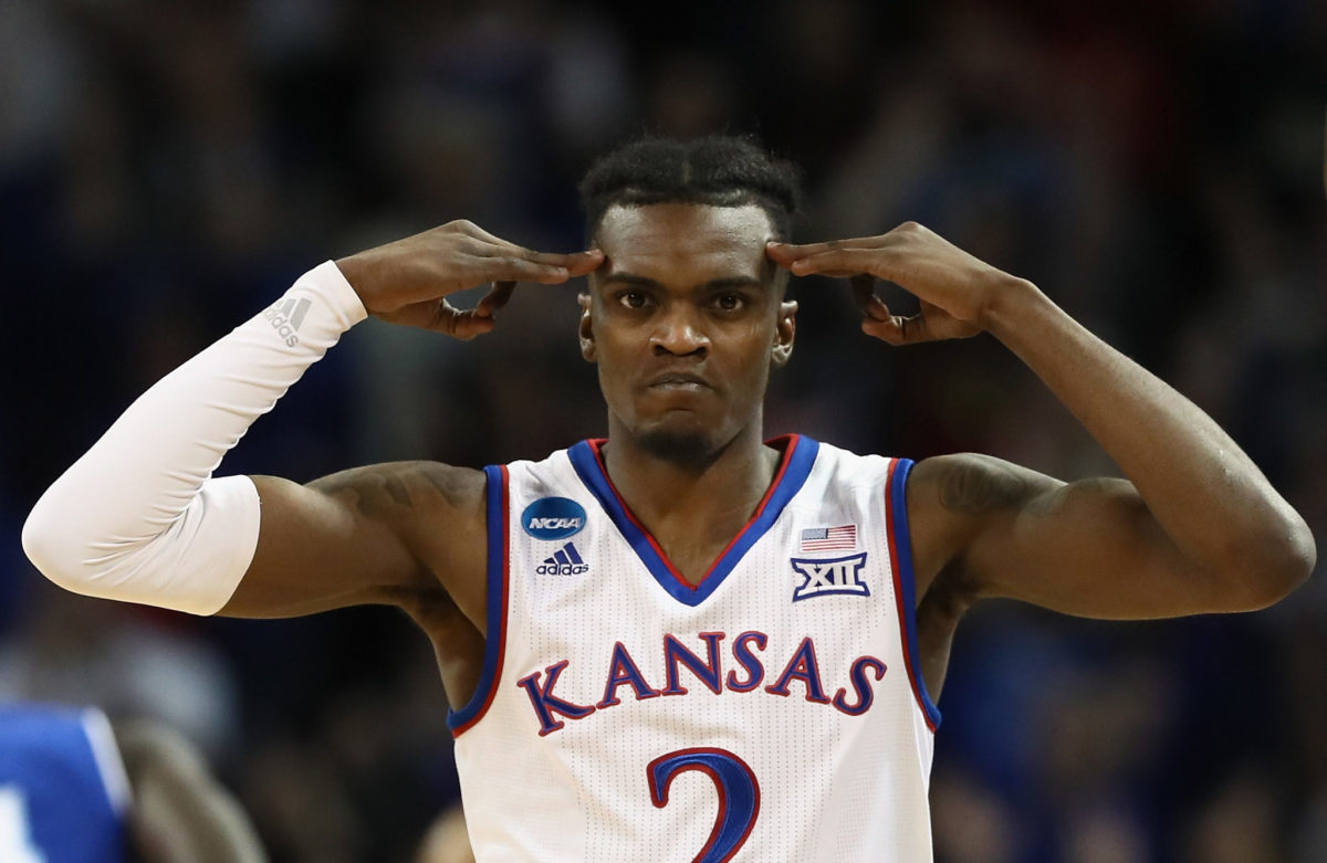 Lagerald Vick with both of his hands on his head.
