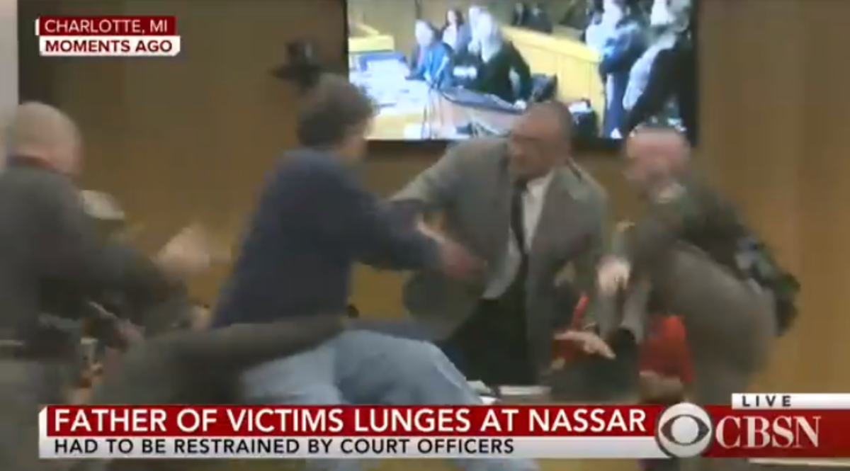 An angry father attacks Larry Nassar.