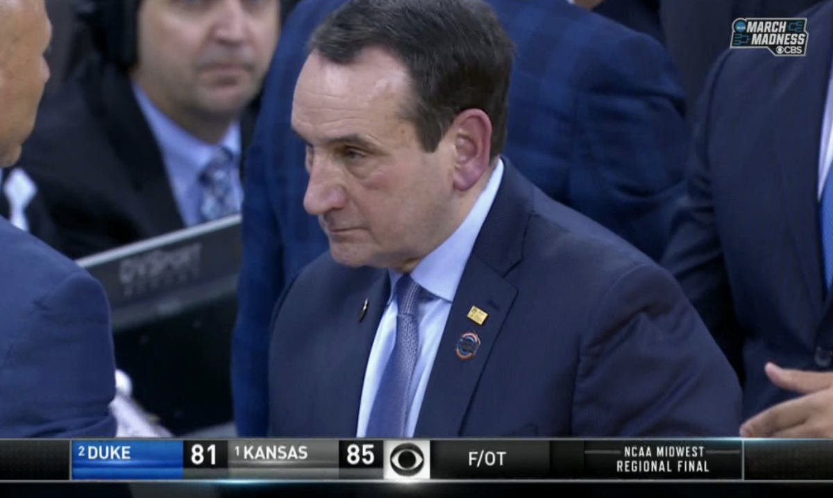 Coach K exits the court after losing to Kansas.
