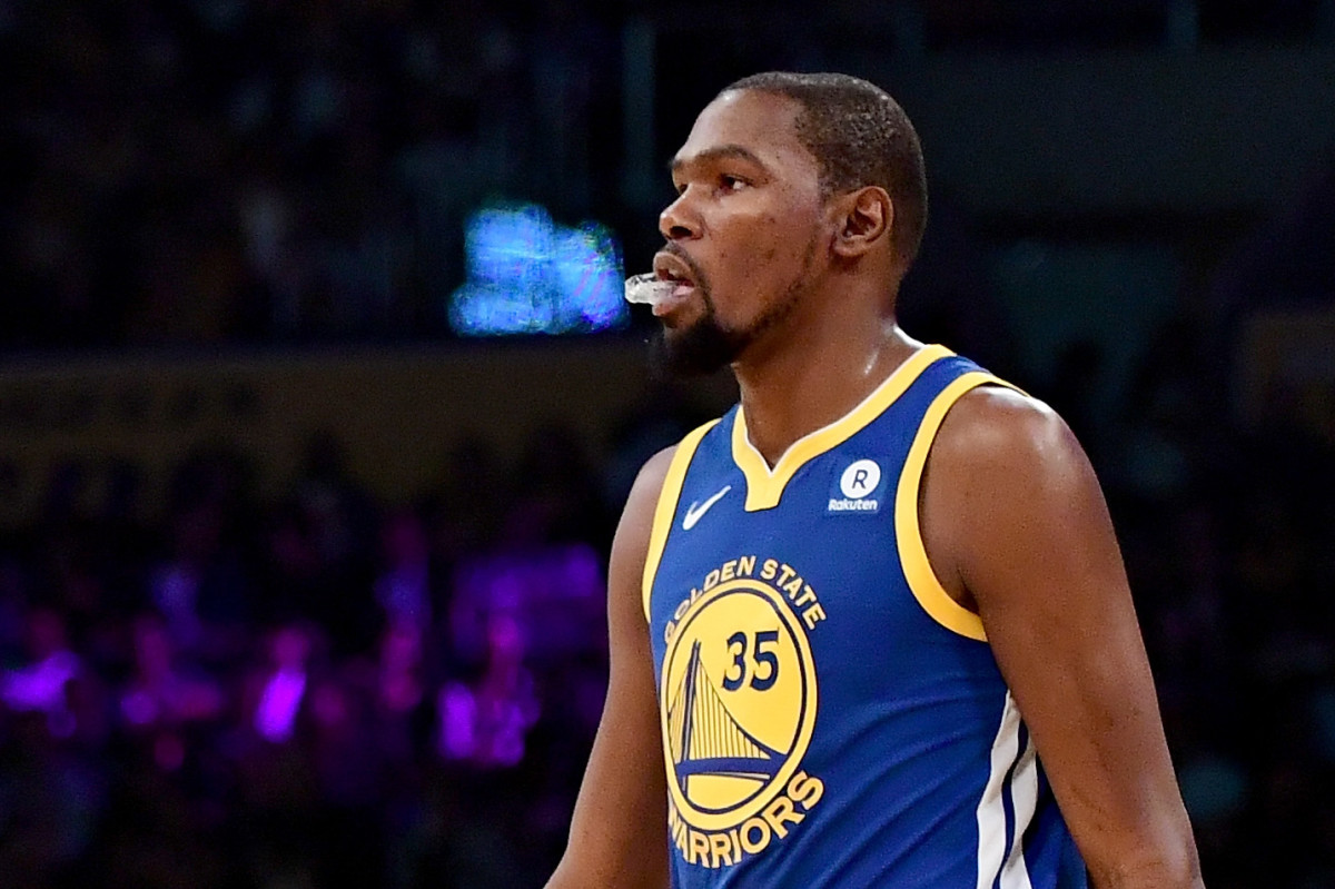 Kevin Durant chewing on his mouth guard.