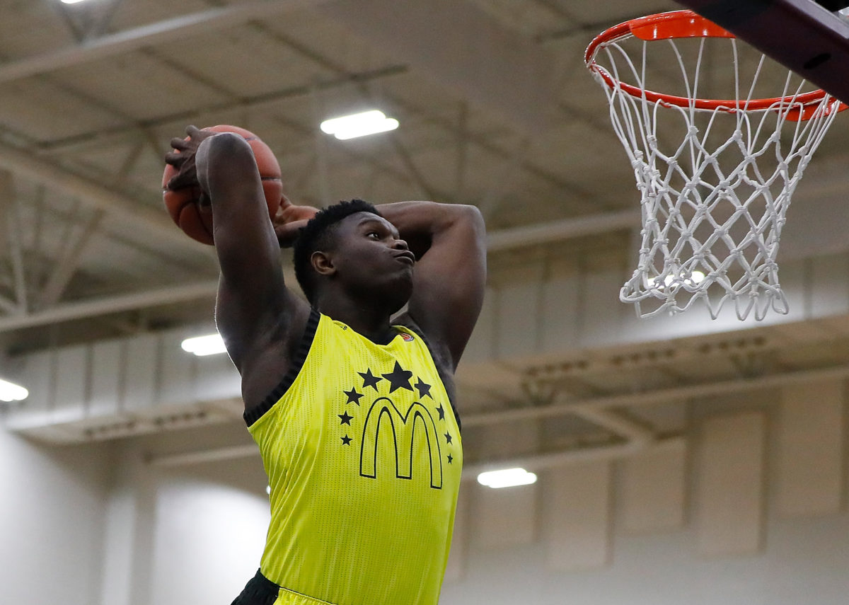 Zion Williamson dunking the ball during the McDonald's All-American dunk contest.