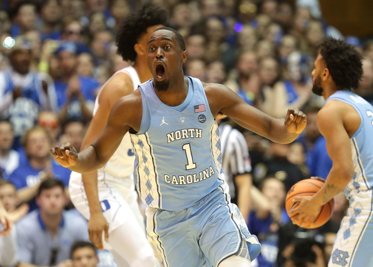 Theo Pinson reacting to a play in a game against Duke.