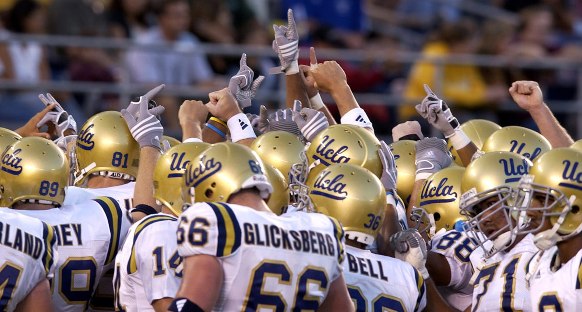 The UCLA Bruins pregame huddle before a game against the San Diego State Aztecs at Qualcomm Stadium.