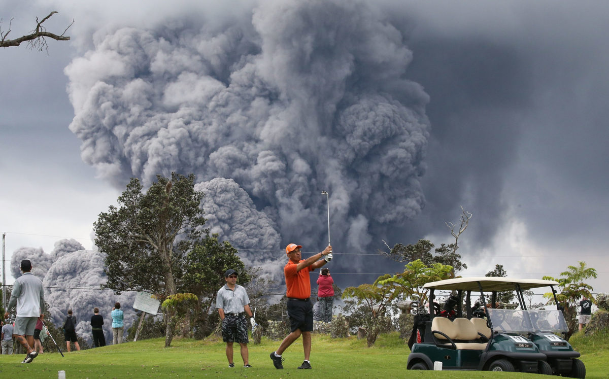 A picture of volcanoes at a golf course.
