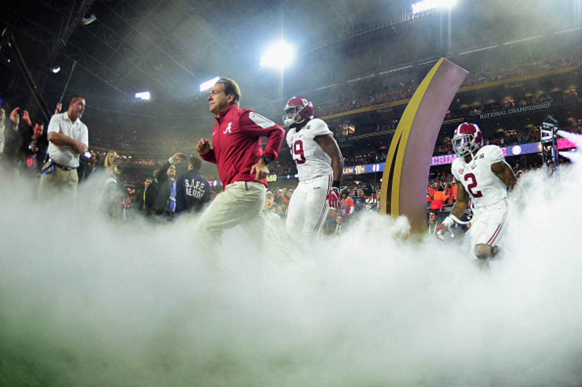 Head coach Nick Saban of the Alabama Crimson Tide takes the field with his team prior to the 2016 College Football Playoff National Championship Game against the Clemson Tigers.