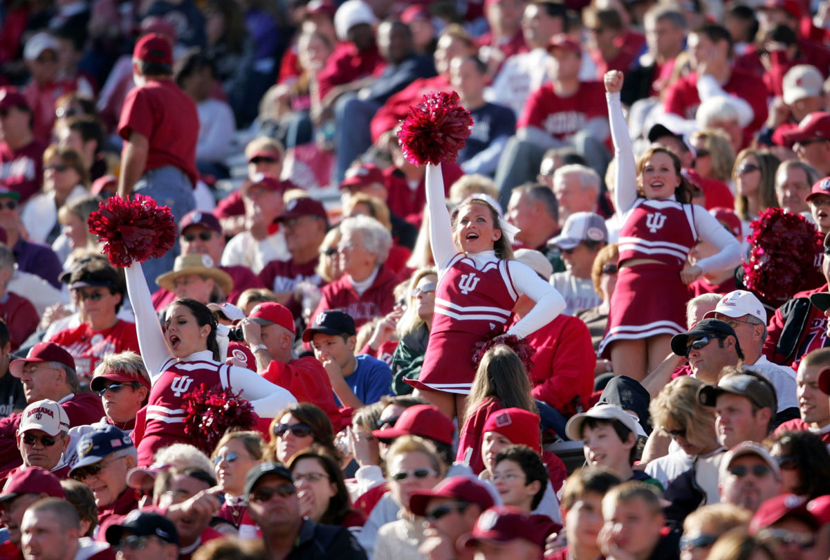 The Indiana Hoosiers cheerleaders lead cheers in the crowd during the game against the Ball State Cardinals at Memorial Stadium.