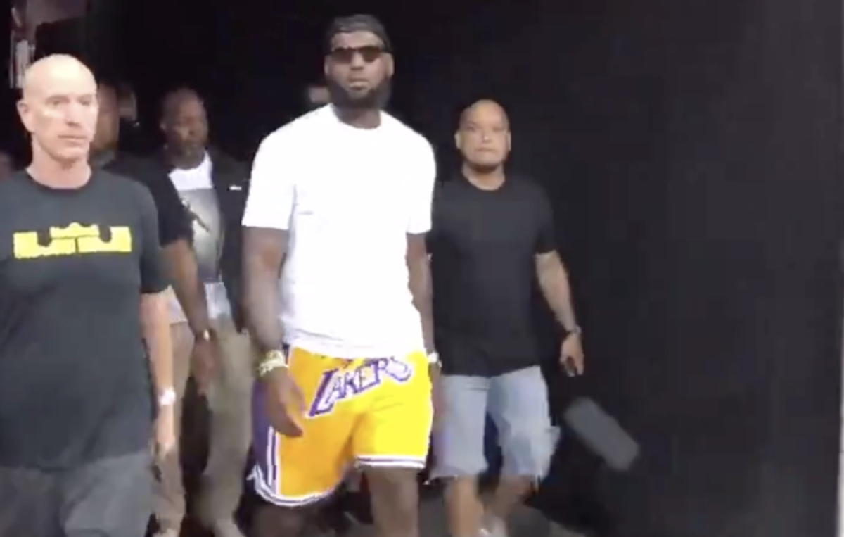 LeBron James wears Lakers shorts.