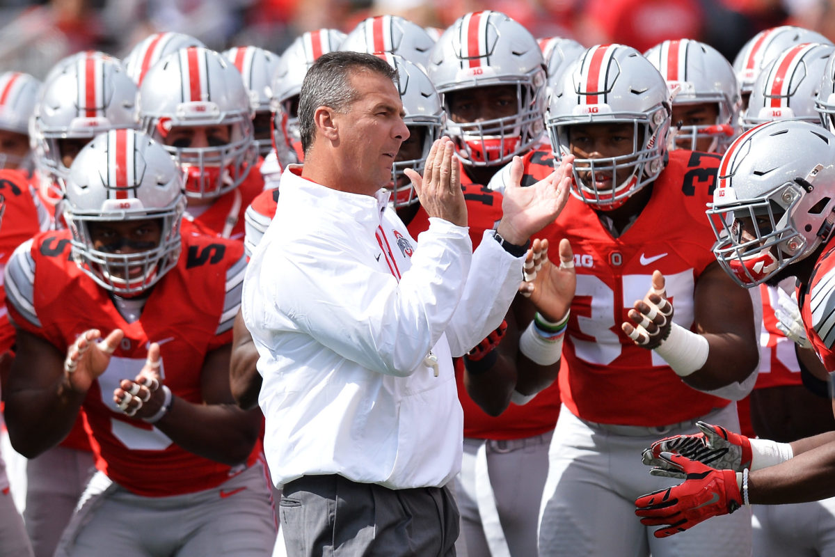Urban Meyer rallying his team up before a game.