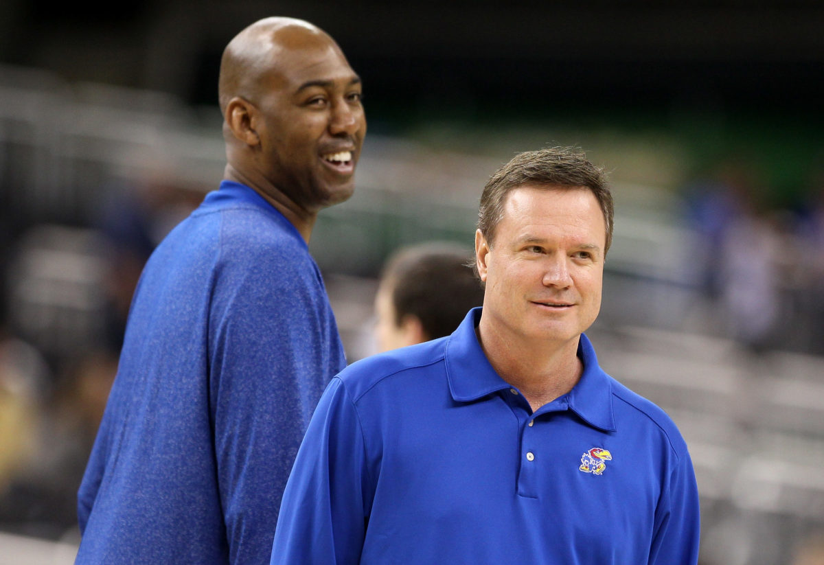 Bill Self and Danny Manning during a Kansas basketball practice.