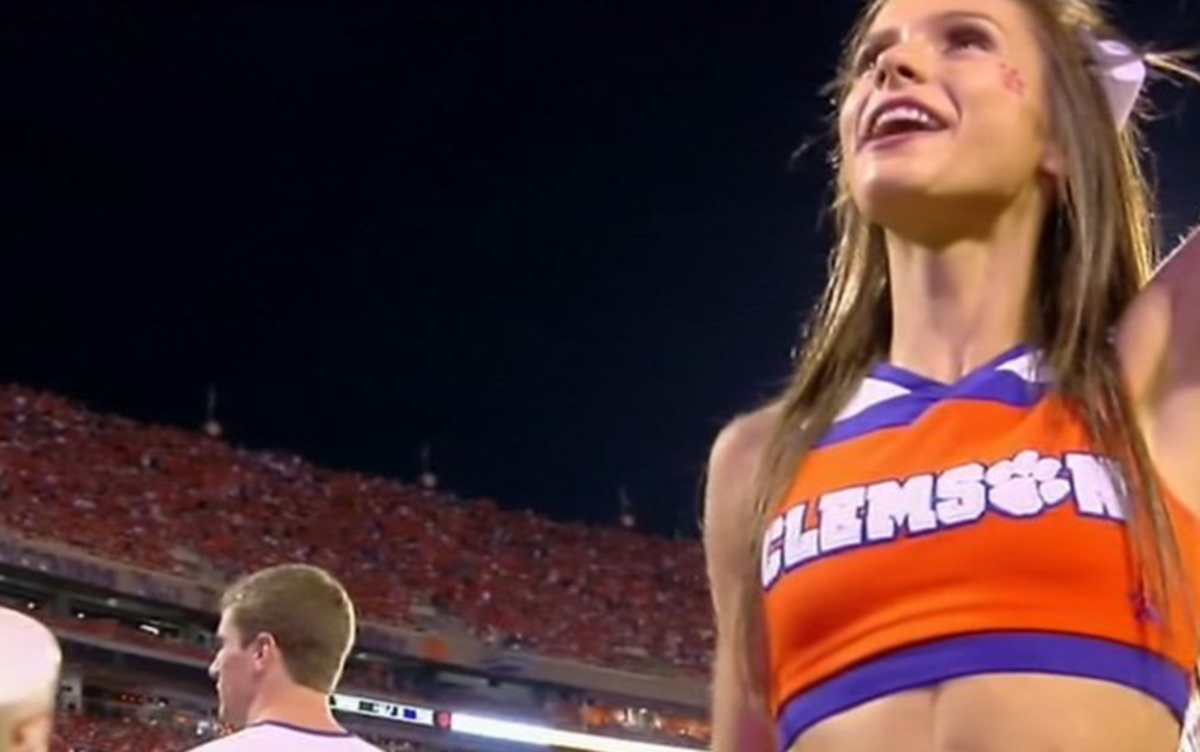 Clemson cheerleader with ridiculous abs.