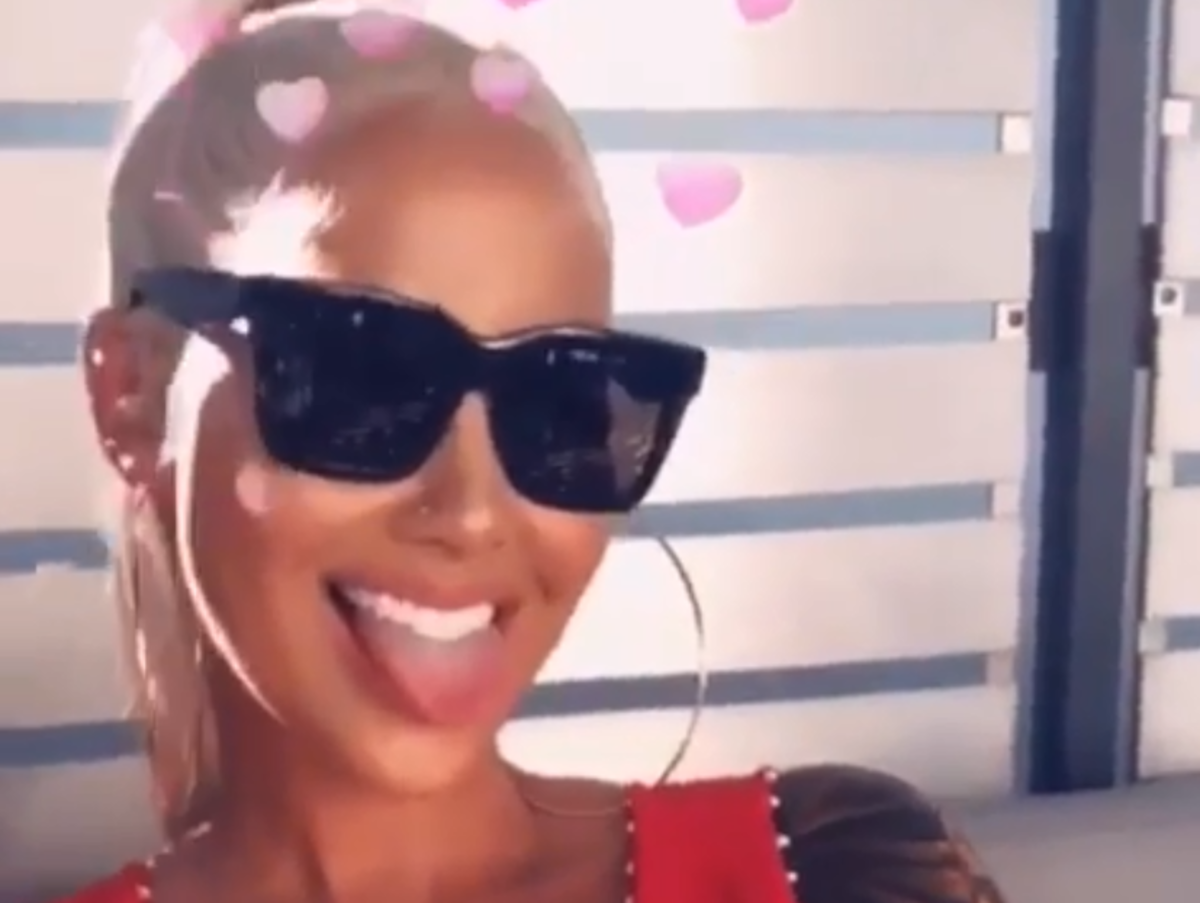 Amber Rose smiles for the camera.