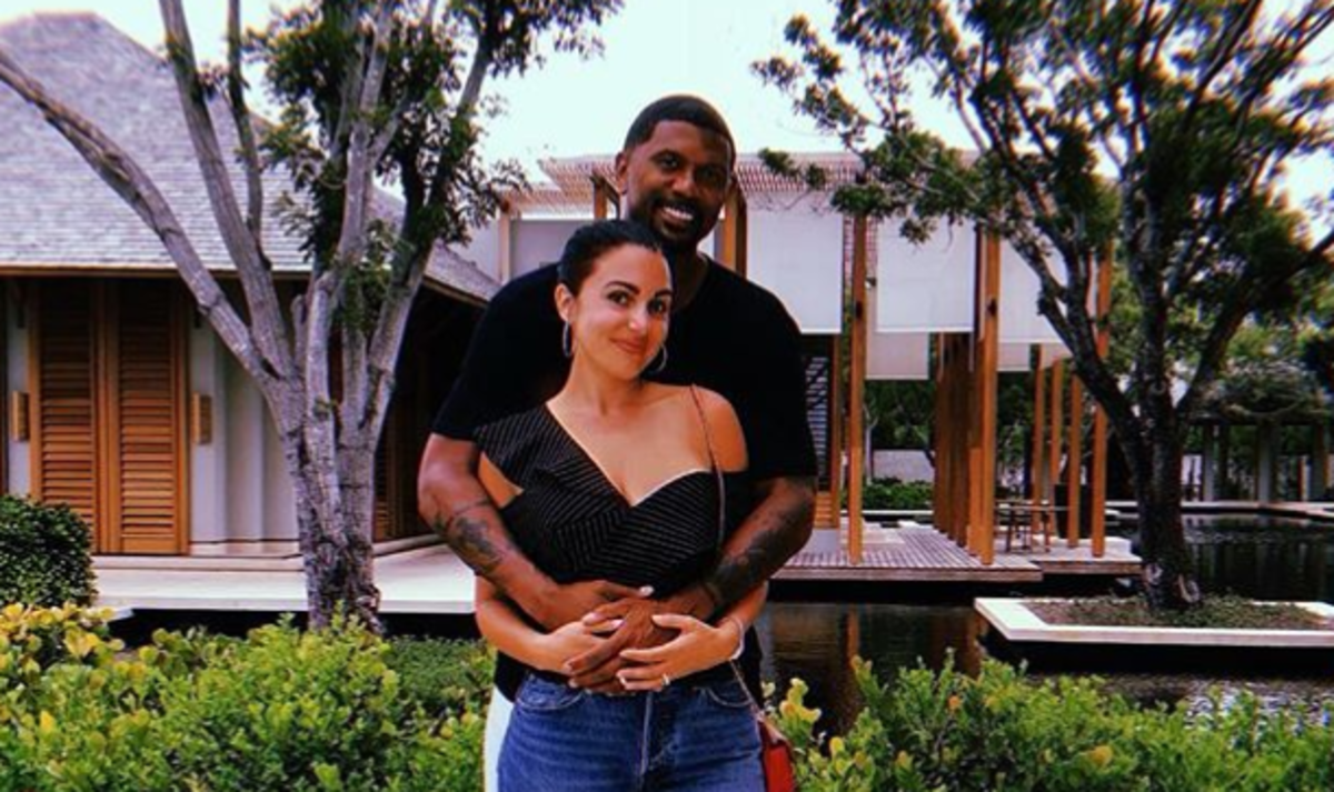 Jalen Rose and Molly Qerim pose for a picture in Turks and Caicos.