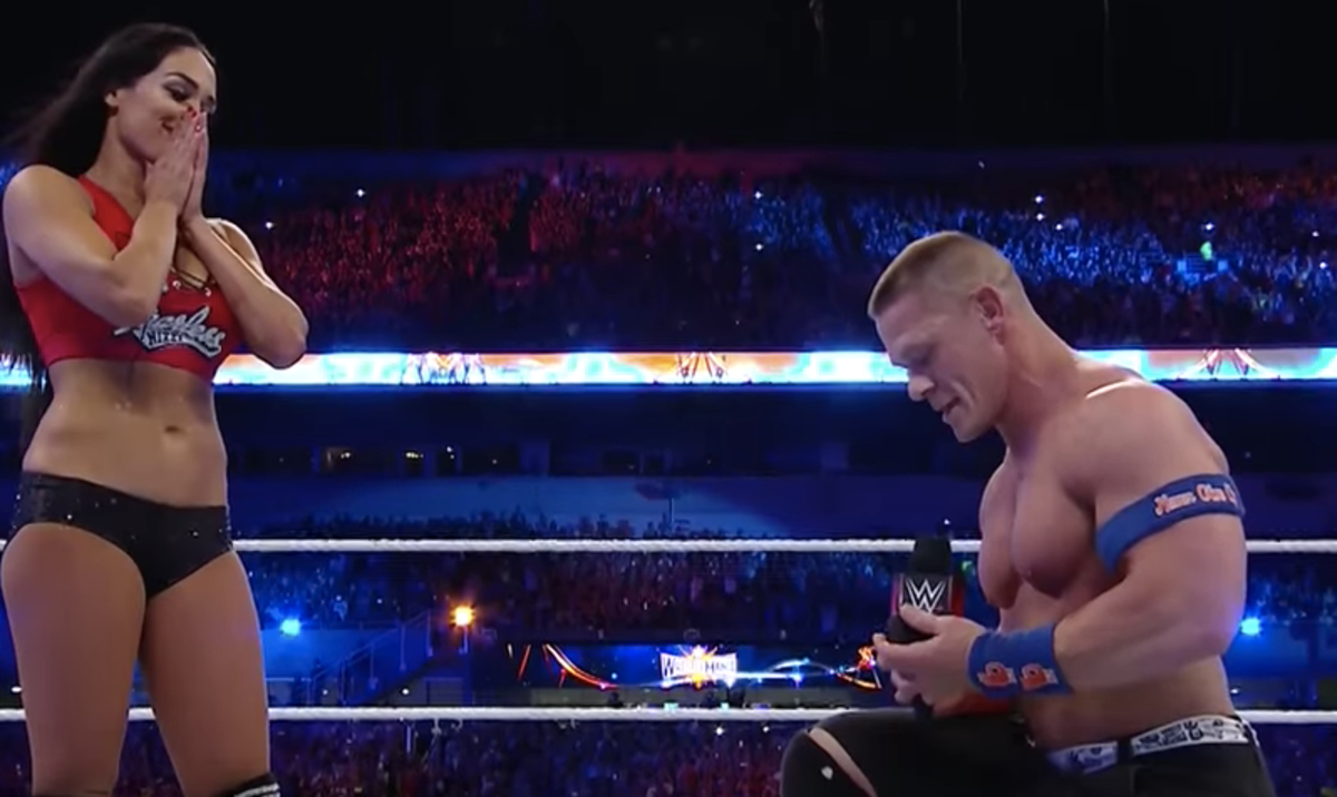 John Cena proposes to Nikki Bella at Wrestlemania.
