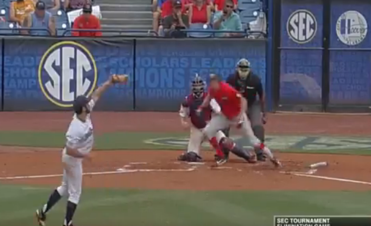 An Ole Miss pitcher making a terrible throw.
