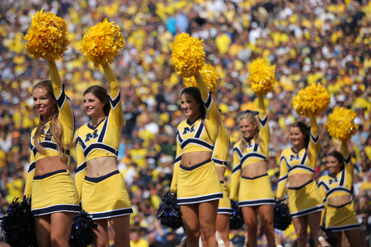 Michigan Cheerleaders performing during a game.