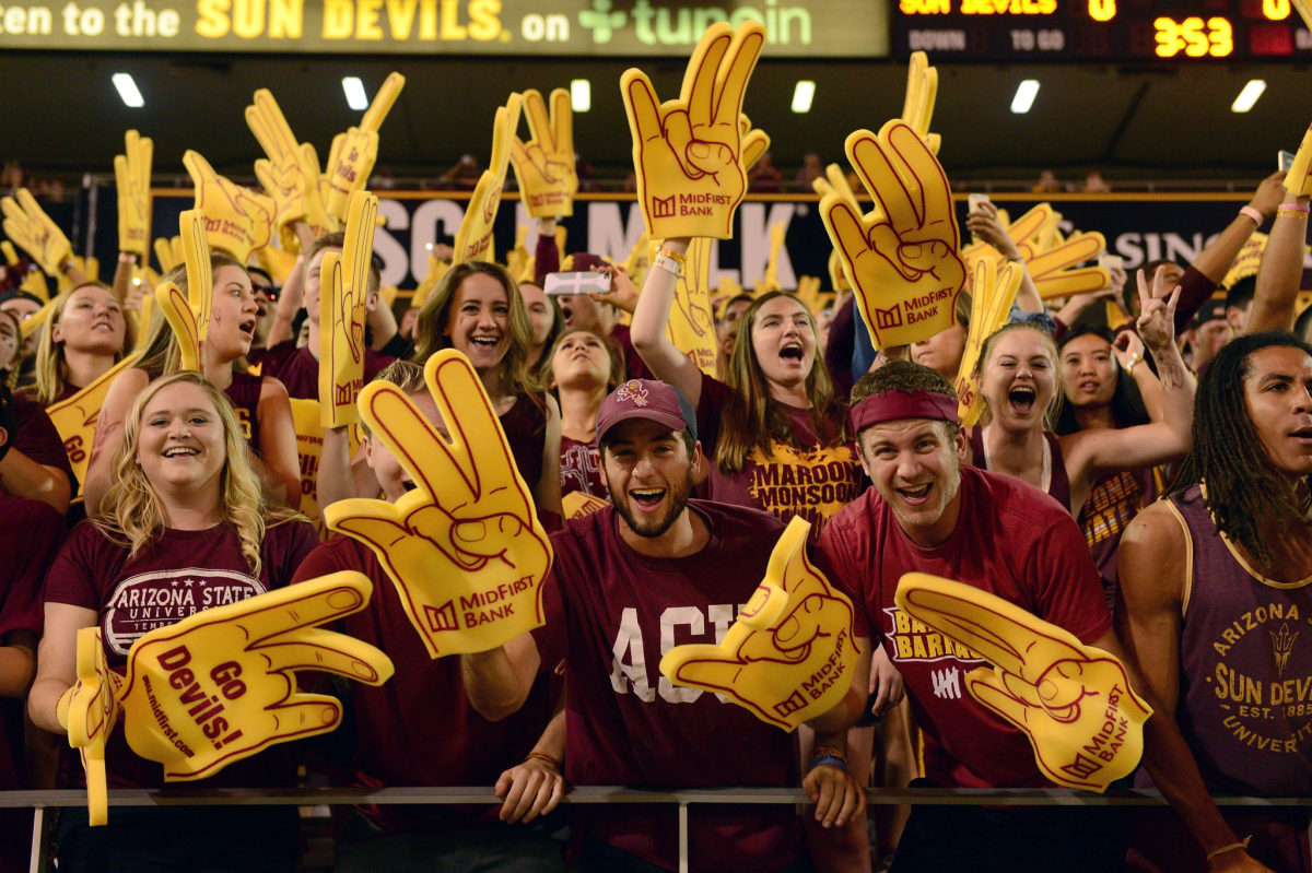 Arizona State Sun Devils fans cheer with foam fingers during the game against the California Golden Bears at Sun Devil Stadium.