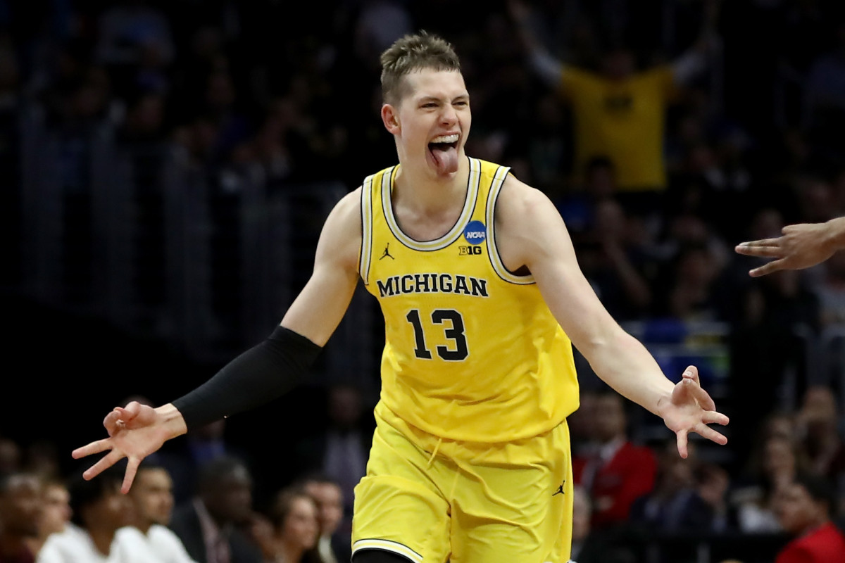 Moe Wagner celebrated after making a three-pointer.