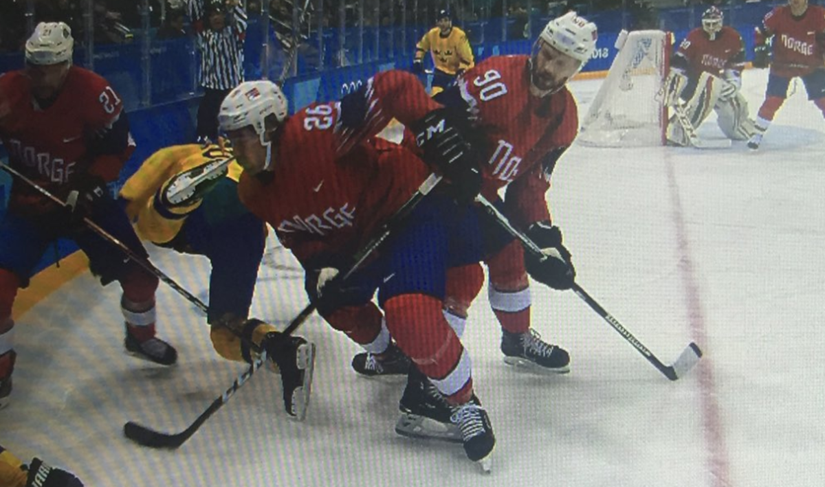 Norway and Sweden playing in hockey.