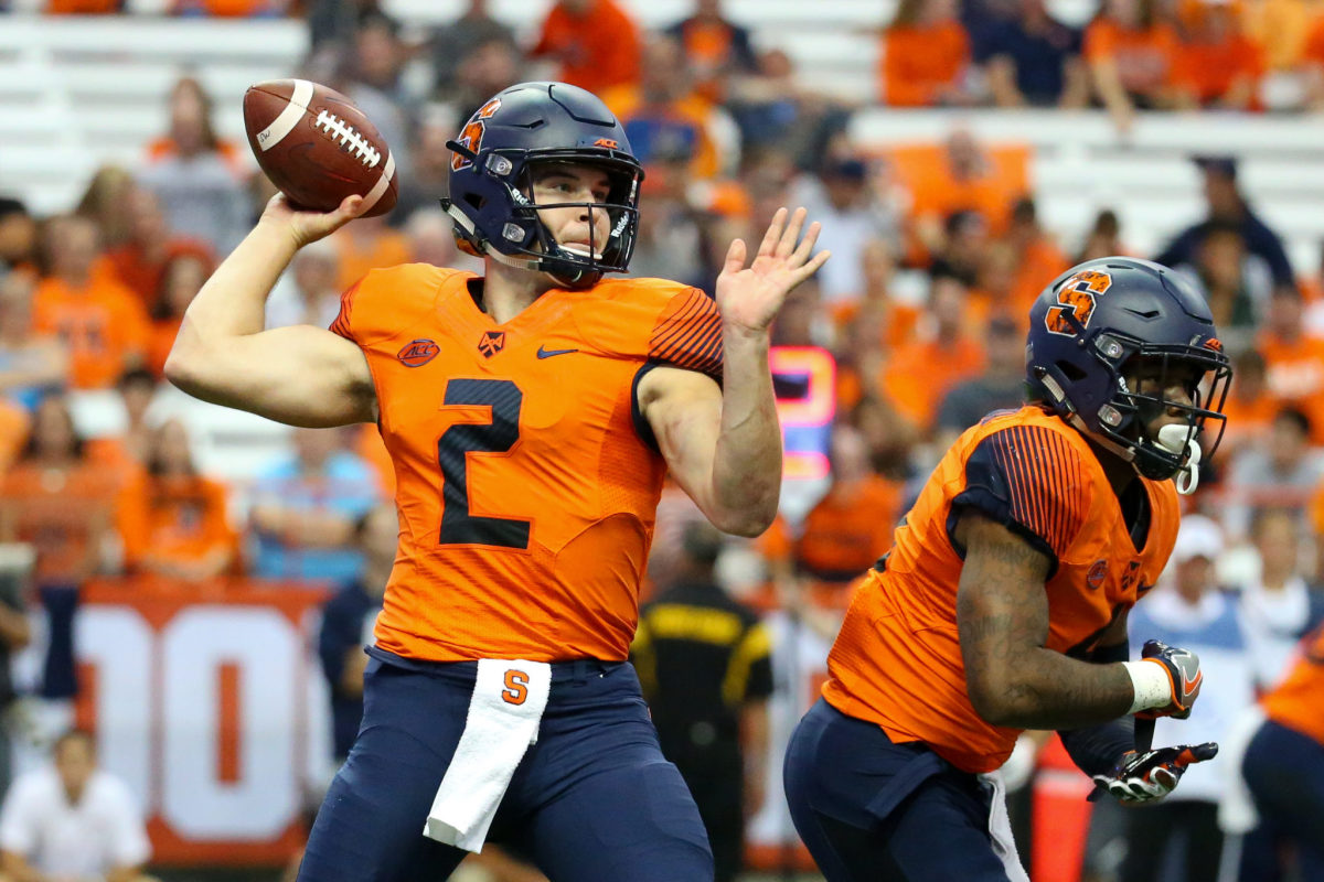 Eric Dungey throws a pass for Syracuse.