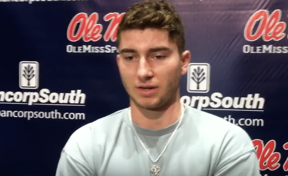 Shea Patterson speaks to reporters.