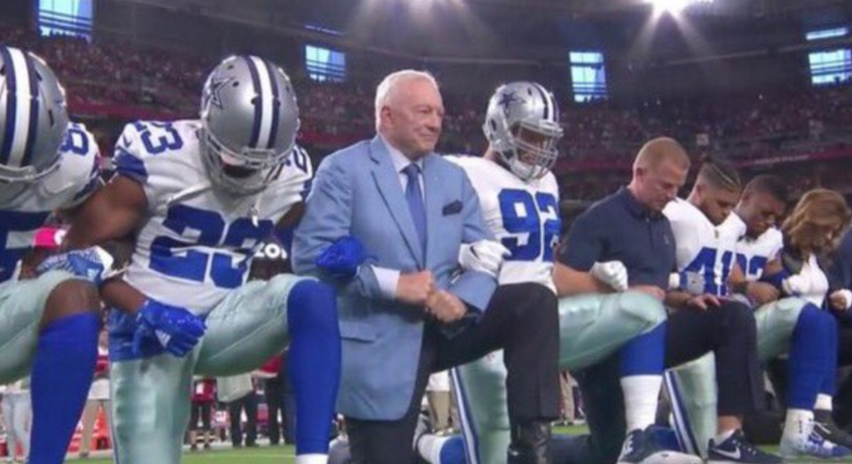 Jerry Jones takes knee with Cowboys.