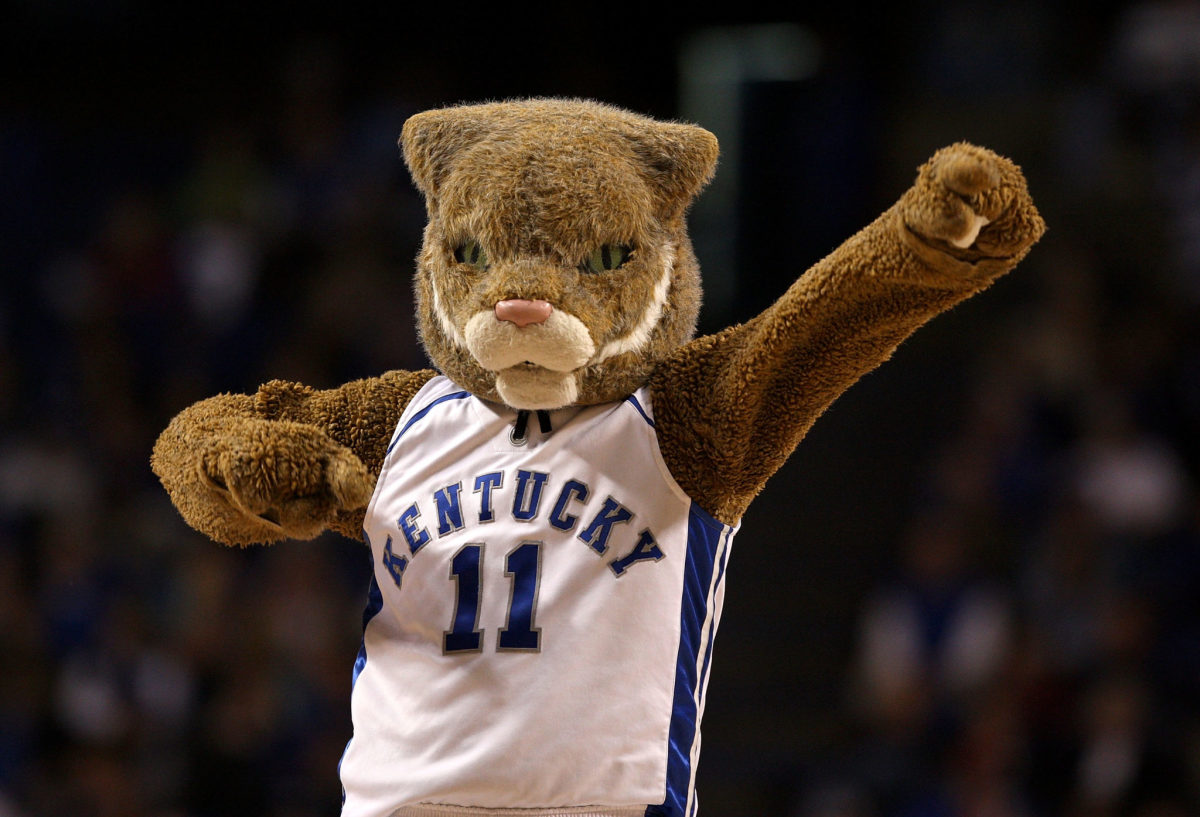Kentucky's mascot pumping his fists on the court.