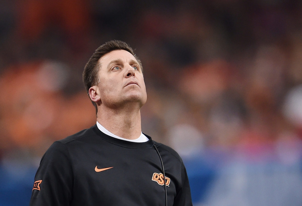 Mike Gundy looks up at the scoreboard during the Sugar Bowl.