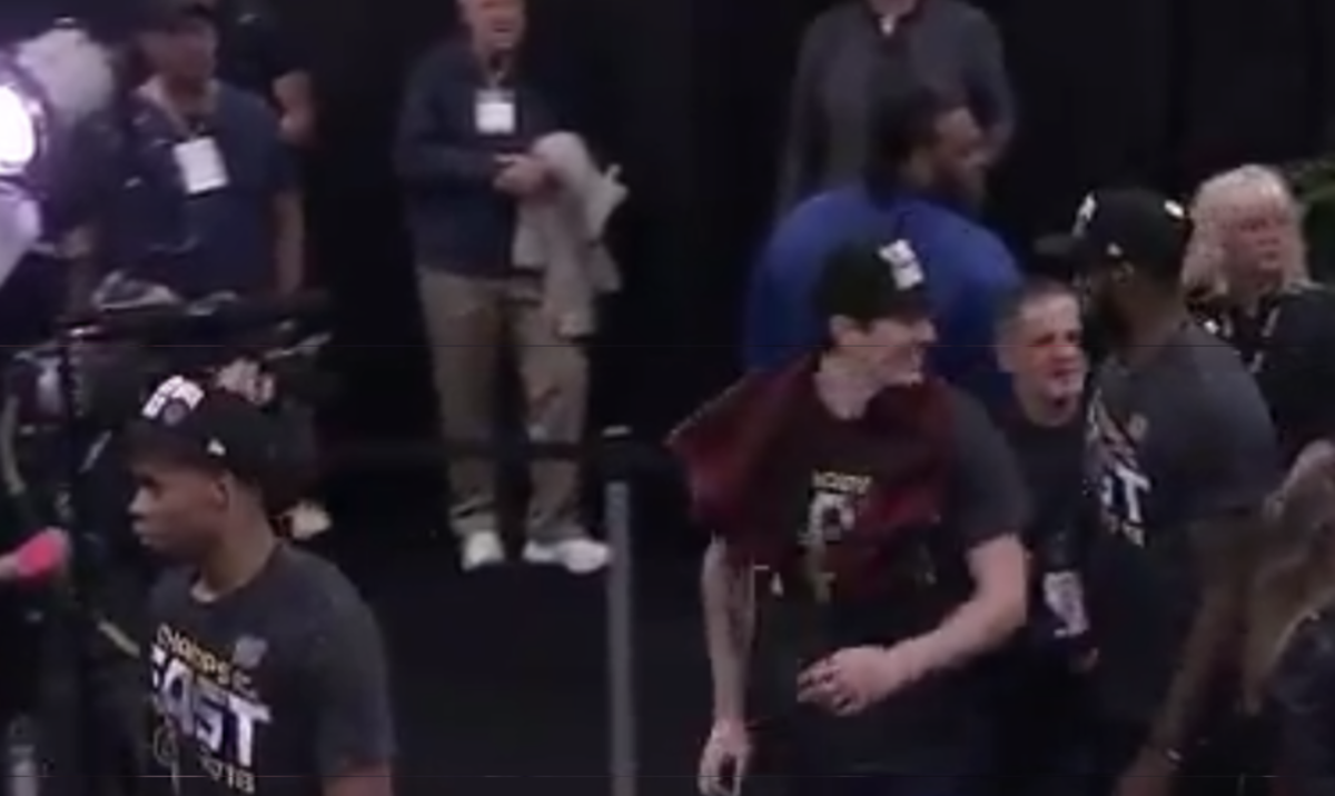 LeBron James giving Dan Gilbert the cold shoulder.