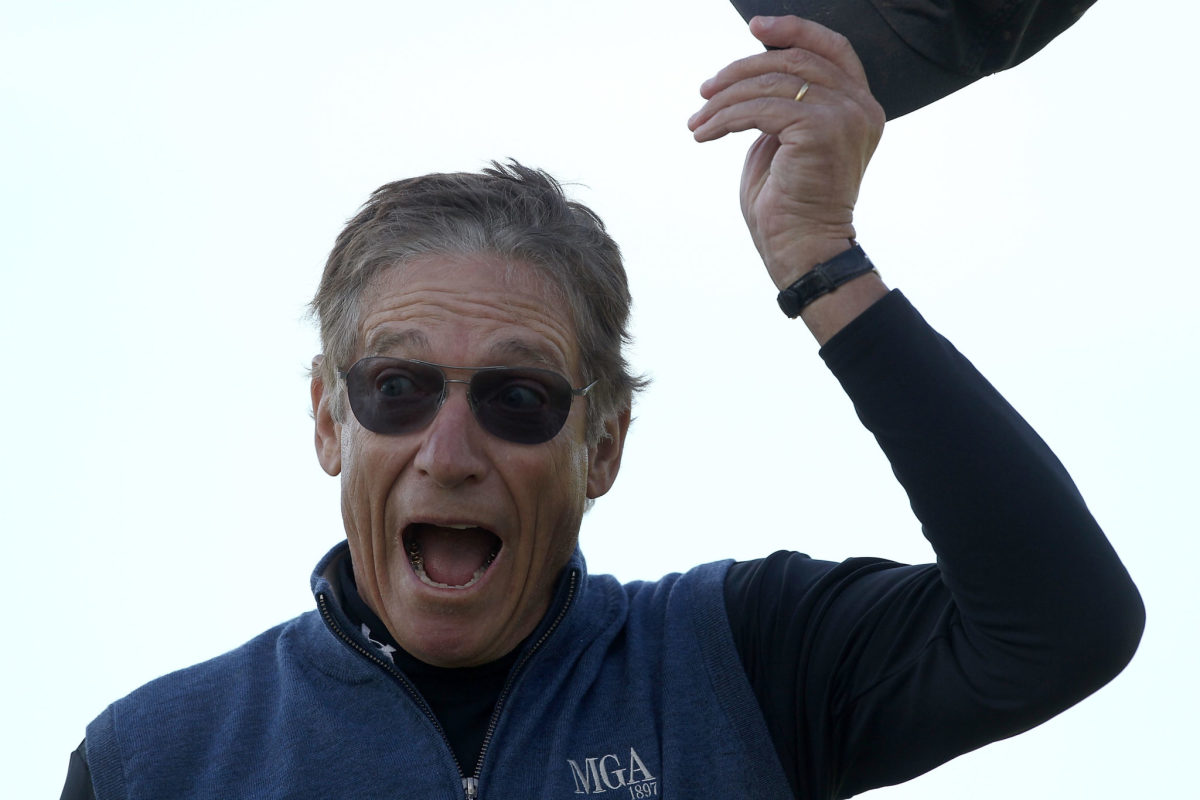 maury povich reacts to making a putt