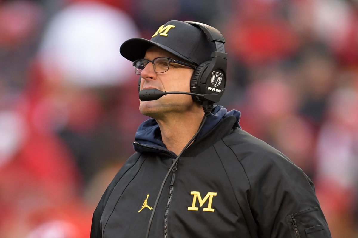 Jim Harbaugh looks content from the sidelines.