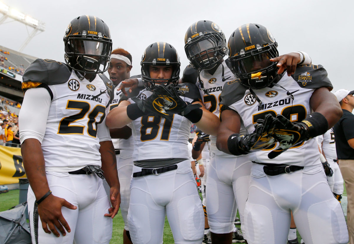 missouri players celebrate during a bowl game