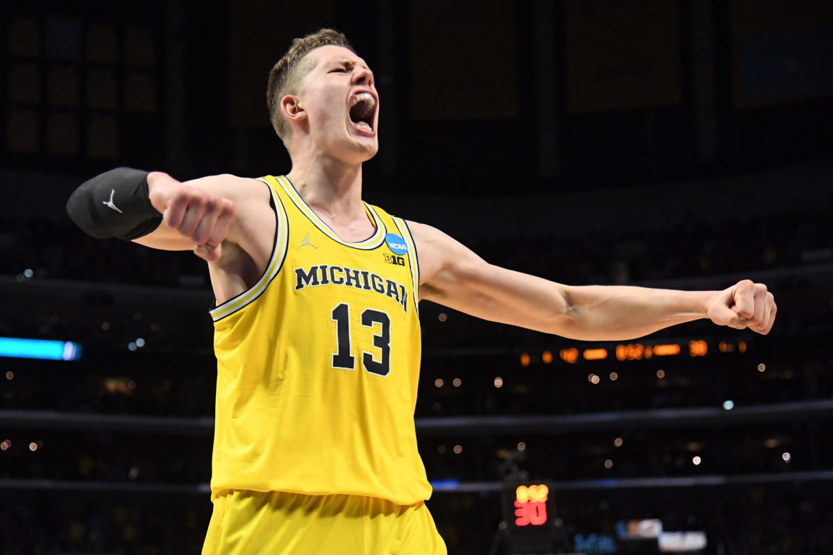 Moritz Wagner of the Michigan Wolverines reacts after making a basket and getting fouled in the second half while taking on the Florida State Seminoles in the 2018 NCAA Men's Basketball Tournament.