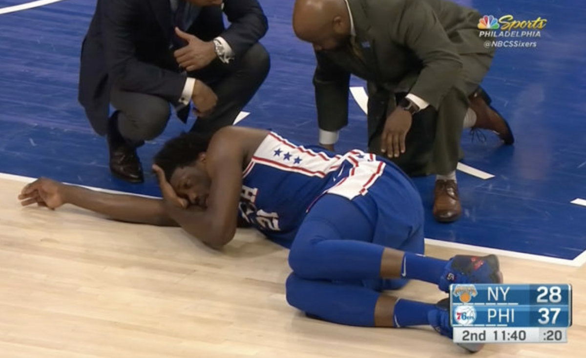 Joel Embiid knocked out of game against Knicks with head injury.