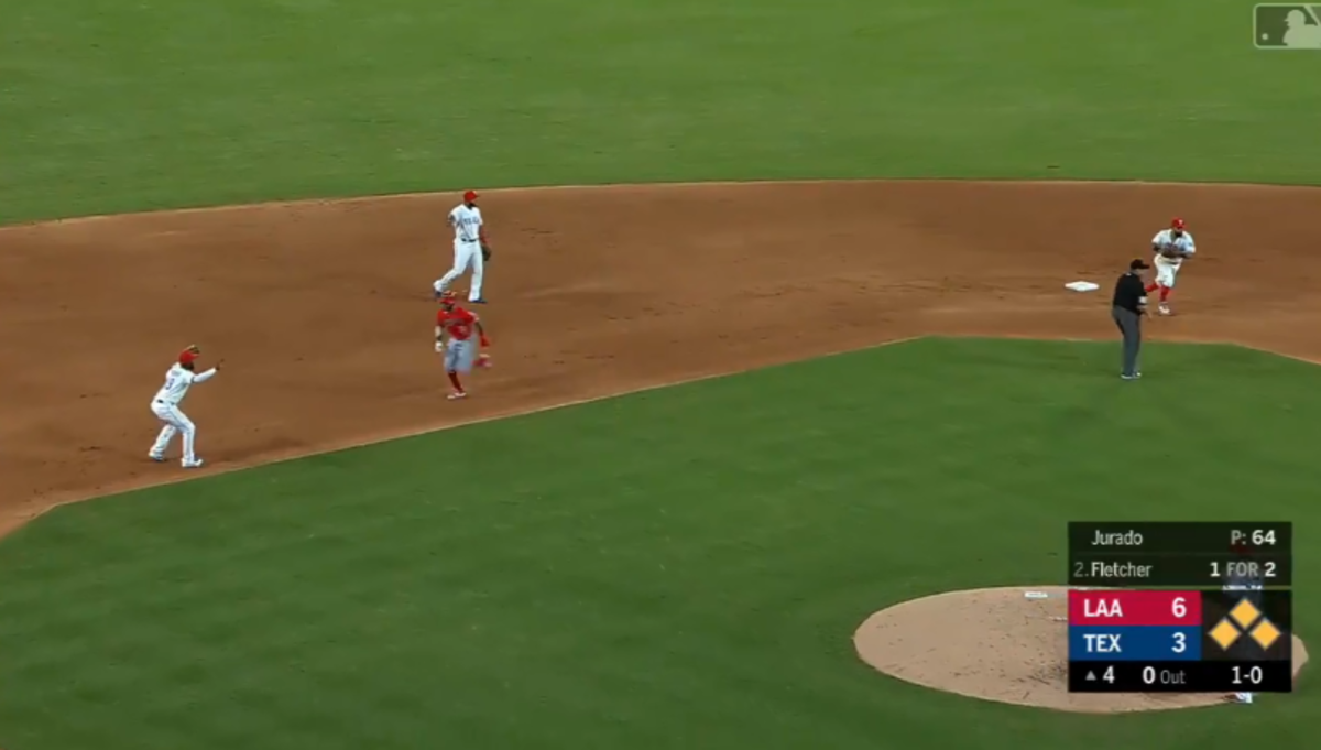 The Texas Rangers turning a triple play.
