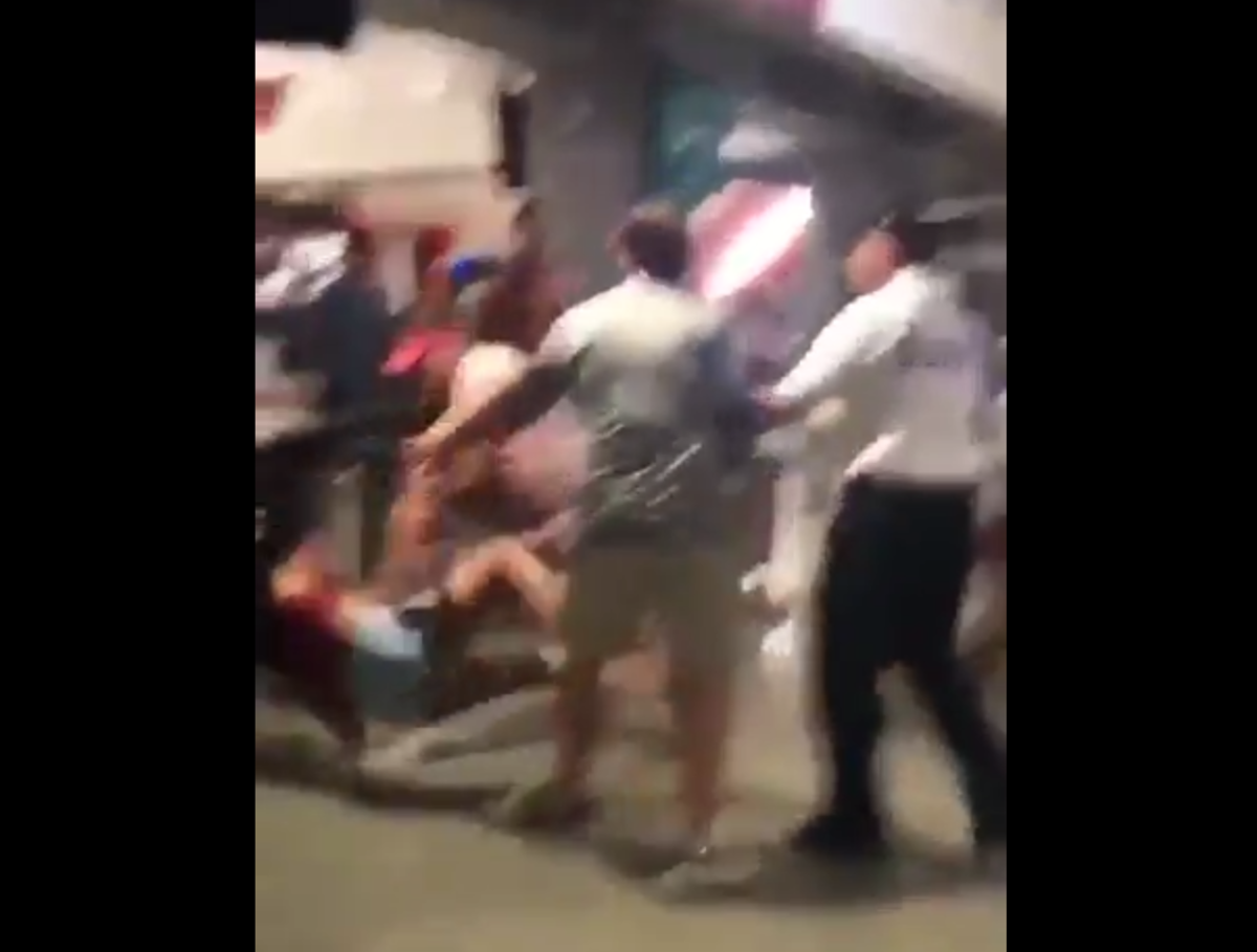 A woman is thrown to the ground during Alabama vs. Florida State.