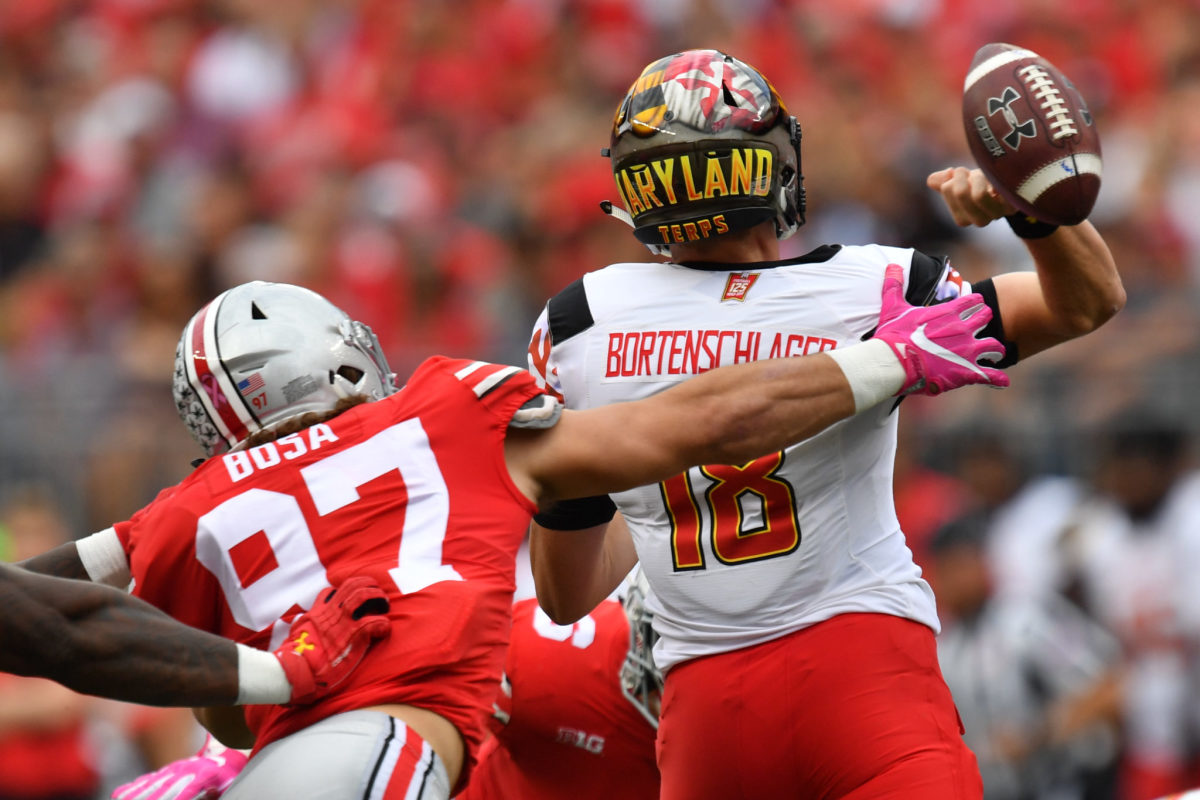 Ohio State's Nick Bosa forcing a fumble the Maryland QB to fumble.