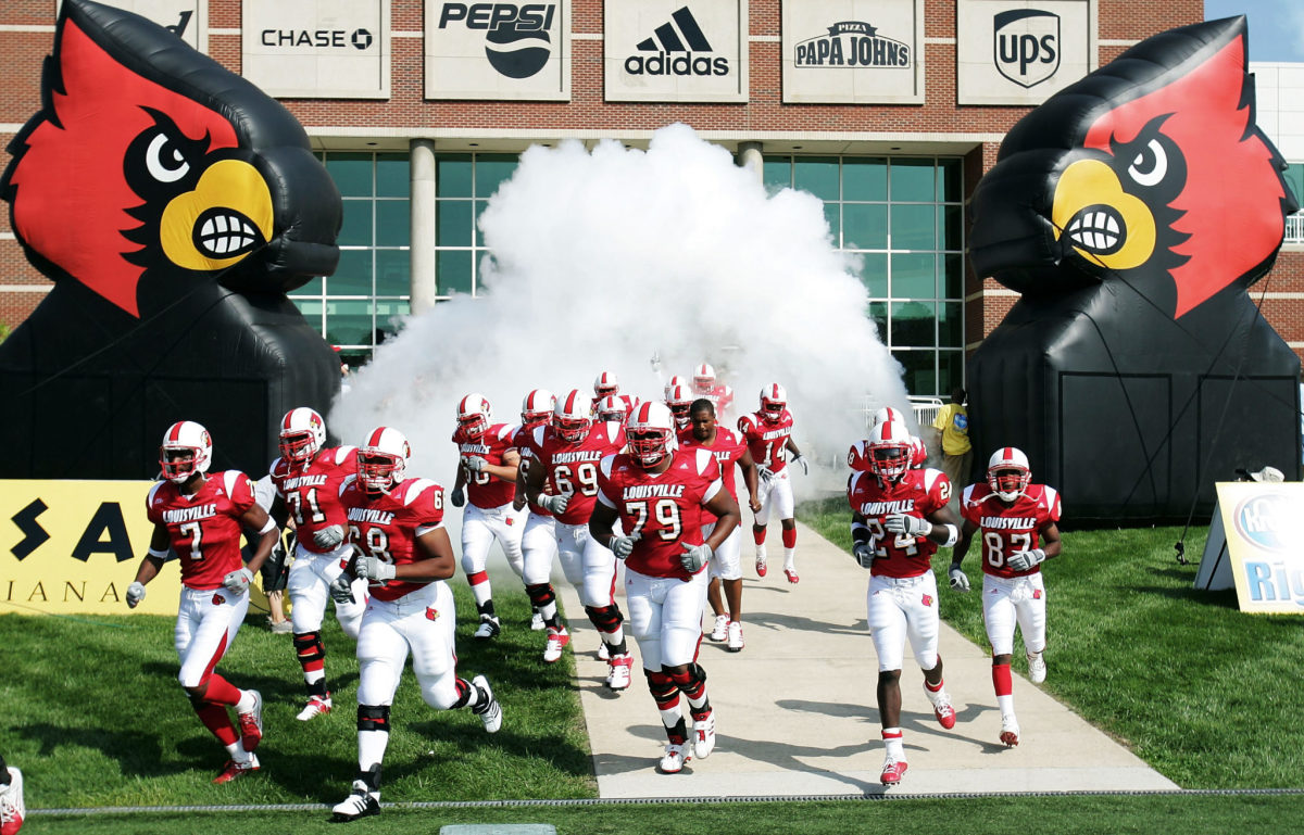 Cardinals to the Rescue: Louisville Football Players Help Flip Overturned  Car Near Stadium