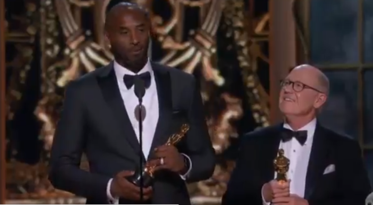 Kobe Bryant accepts an Oscar.