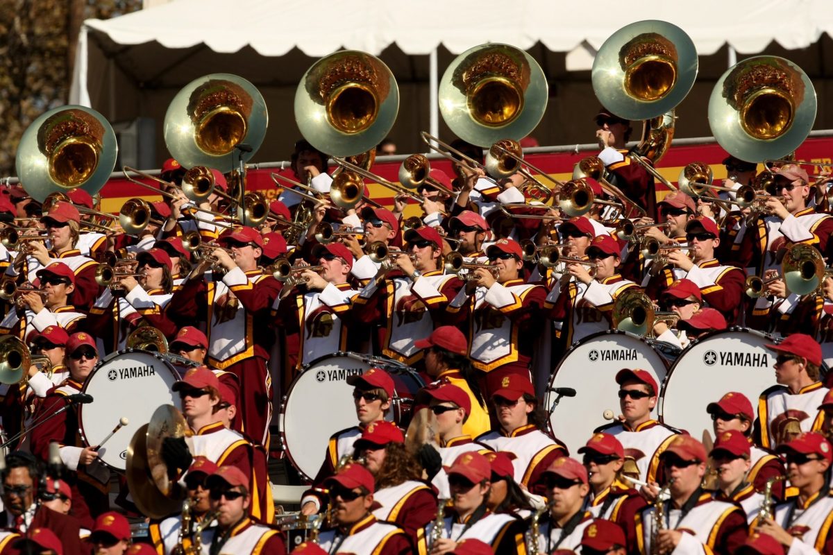 A photo of USC's band playing during a football game.