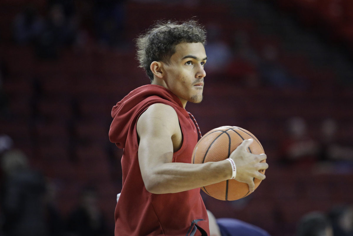 A closeup of Trae Young warming up before an Oklahoma game.