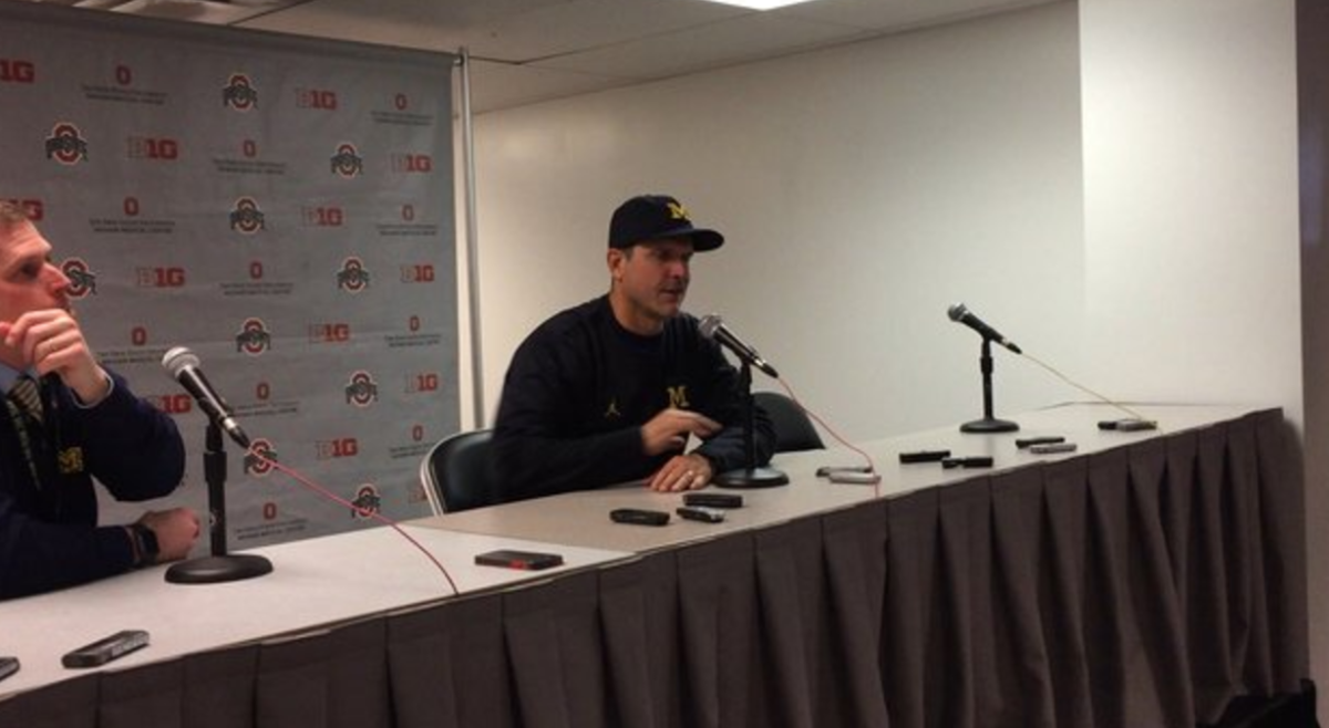 Jim Harbaugh answers questions after the Ohio State loss.