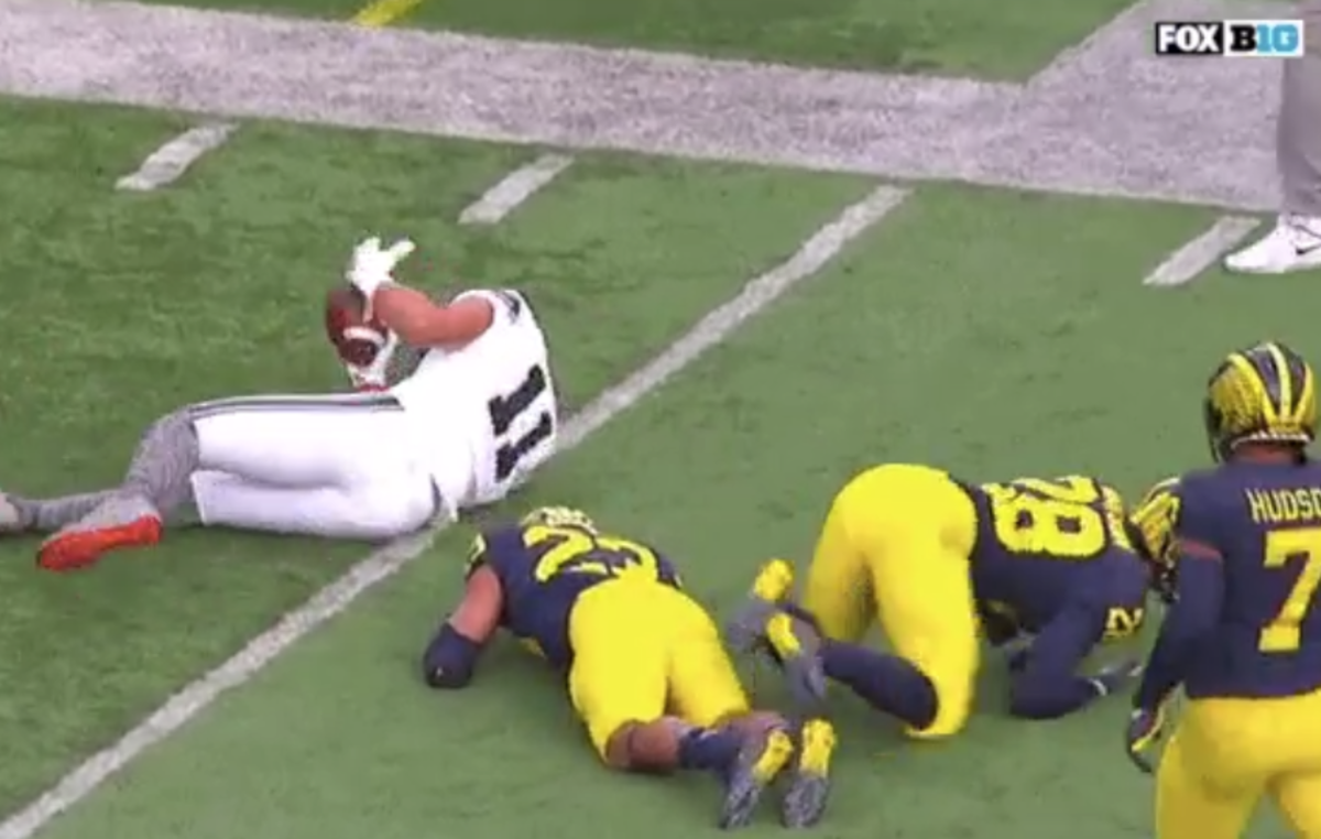 Michigan player goes down with injury vs. Ohio State.