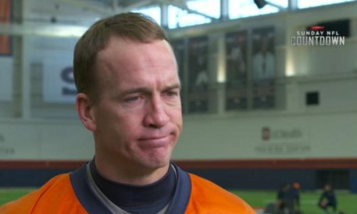 Peyton Manning makes an interesting face during interview.