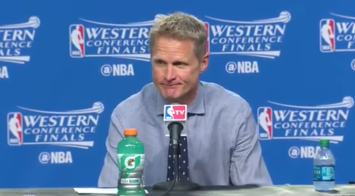 Steve kerr looks unhappy in post game press conference.