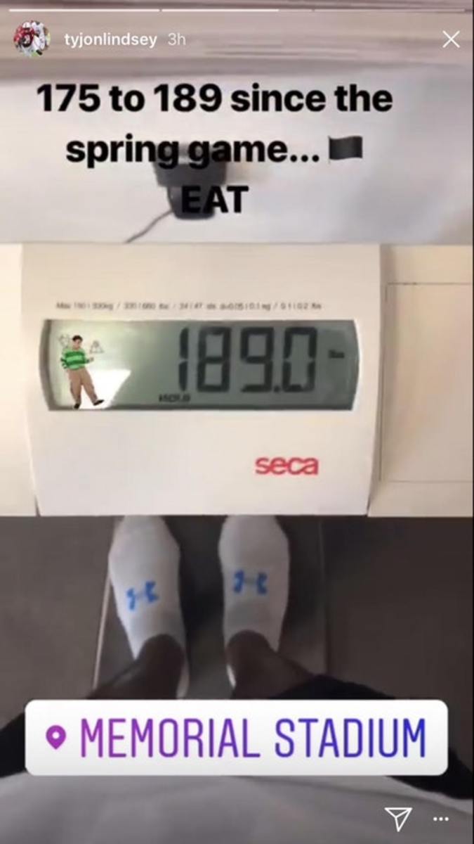 Tyjon Lindsey weighing himself.