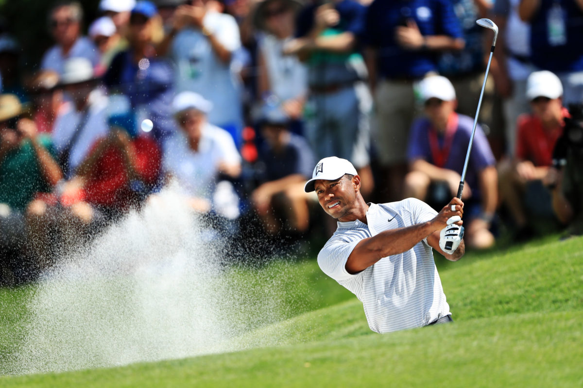 Tiger Woods takes a shot at the 2018 PGA Championship.
